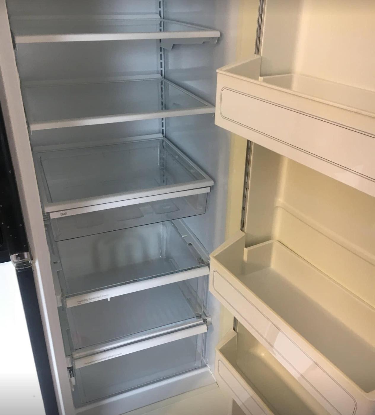 Refrigerator, glass shelves, after we cleaned it