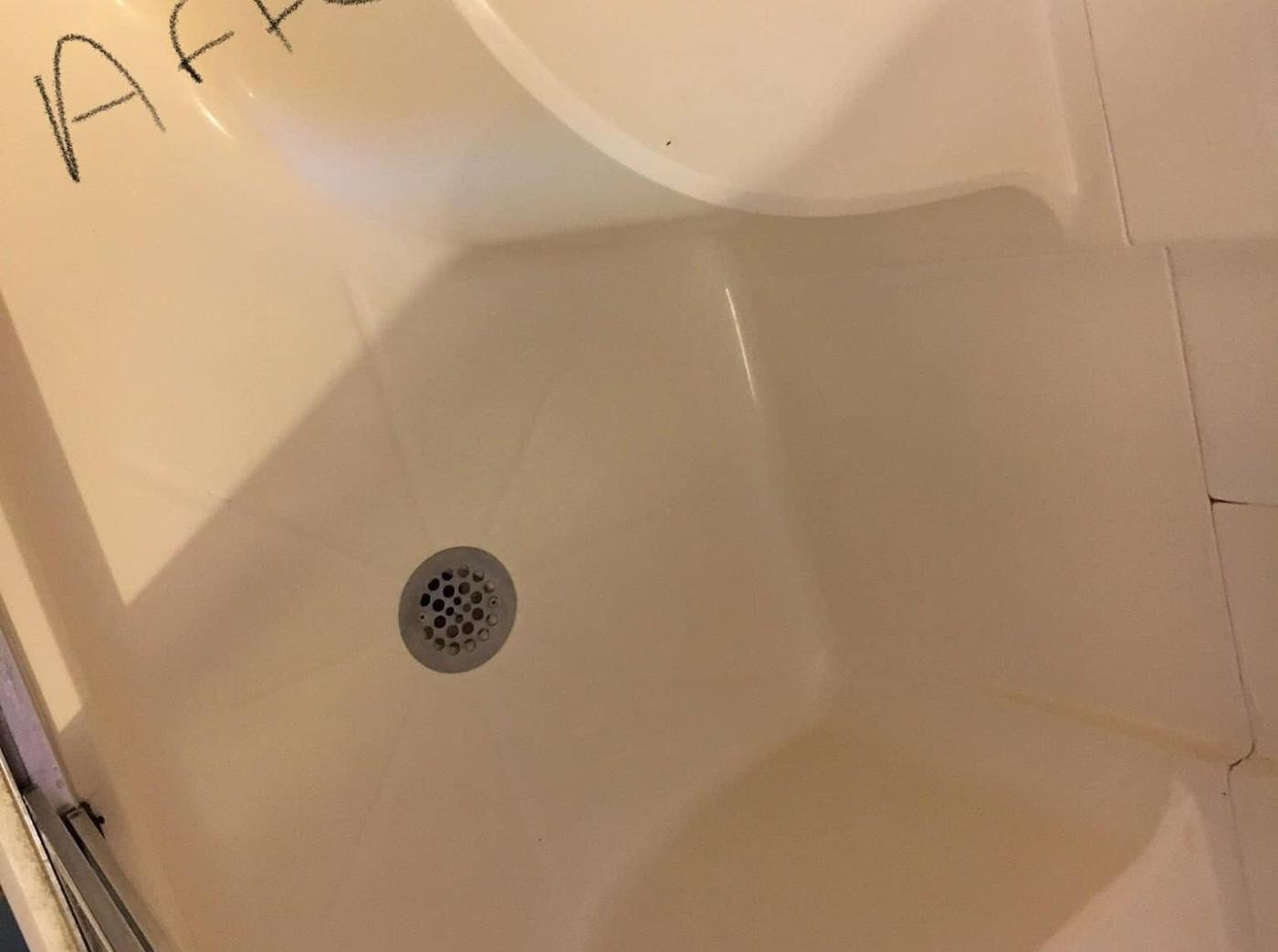 Corner shower stall, after we cleaned it